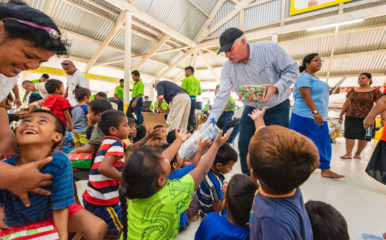 Samaritan's Purse President Franklin Graham hands out Operation Christmas Child shoebox gifts in the Pacific Island nation of Kiribati.