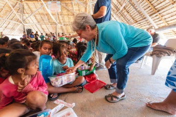 Jane Graham delivers gifts as well during an outreach event on the Pacific island of Tarawa.