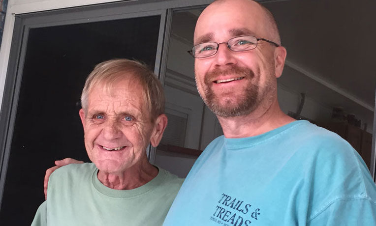 Bob Bushway, left, and his son Robbie. Robbie and his sister LaBelle prayed for decades that Bob would turn to Christ, and he did after Samaritan's Purse volunteers shared with him earlier this year.