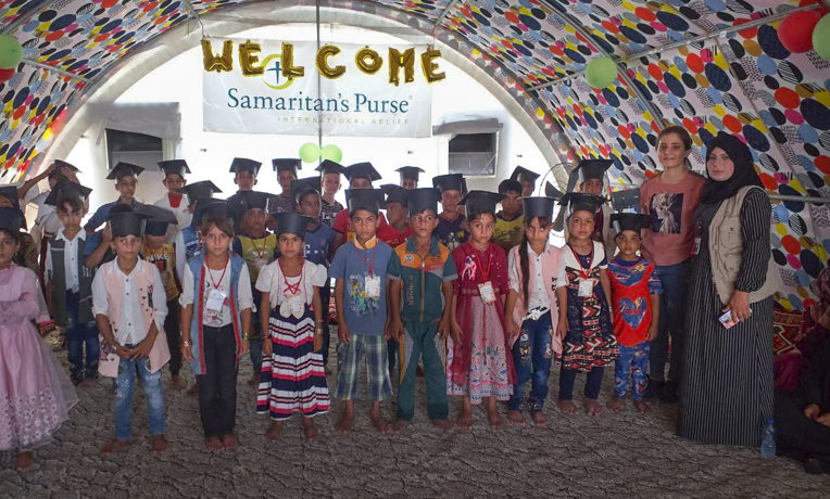 Child Friendly Space participants at a displacement camp in northern Iraq celebrate their graduation from the Samaritan's Purse program.