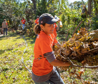 Volunteers clear debris left by an EF3 tornado near Dallas, Texas.