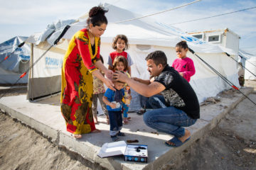 A young refugee received a haircut in Bardarash camp.