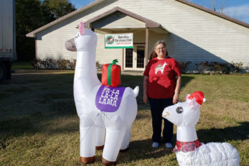 Cherry and the "Alpaca Shoebox" display outside of Grace Baptist.