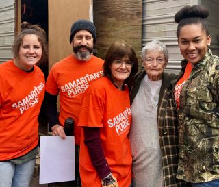 Samaritan's Purse volunteers helped 85-year-old Doris Grayson clean out her flooded home, one of many near Jackson.