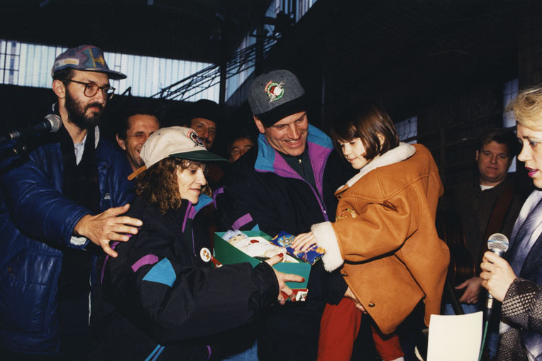 Franklin Graham delivers shoeboxes with Mary Damron in Eastern Europe. 