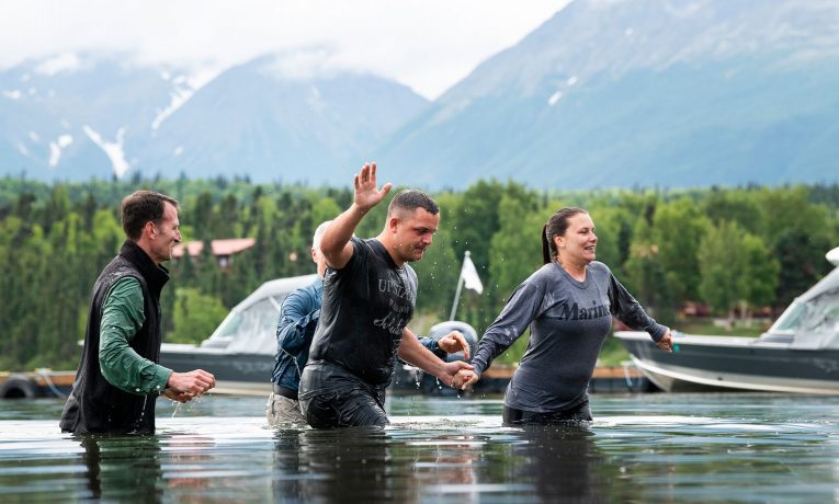 Zach and Courtney Oglesby were both baptized in Lake Clark during Week One at Samaritan Lodge Alaska.