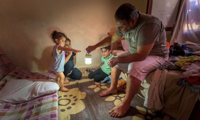 Rahim brings light to the room where his children sleep. Hope, like light, has once again brightened their home in Beirut.