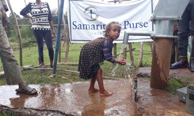 Children in rural Ethiopia enjoy water from a well restored by Samaritan's Purse.