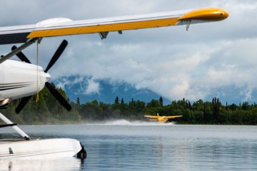 Samaritan's Purse floatplanes, pictured in the foreground and distance, carry military couples into pristine places in the Alaska wilderness.