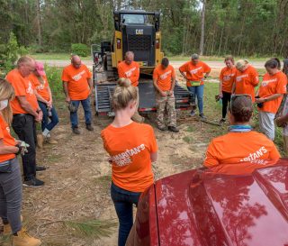 Volunteers are working in Baldwin County, Alabama, where Hurricane Sally flooded homes with torrential rain.