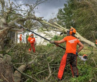 Our disaster relief volunteers are helping cut away trees and remove debris that filled yards after Hurricane Sally roared through.
