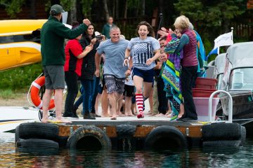 Southern do the polar plunge into chilly Lake Clark