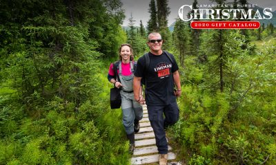 Jake and Susan Southern walk through the Alaska wilderness.
