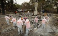 Volunteers are sifting through the ashes of homes burned by wildfires in Jackson County, Oregon.