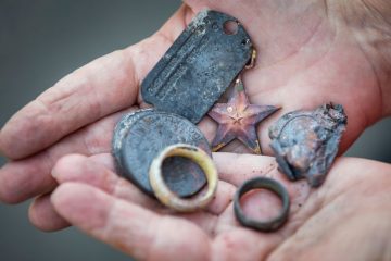 Volunteers recovered a number of military decorations at Paula Vessels' property belonging to her late brother and father, including a Bronze Star, Purple Heart and World War II dog tag.