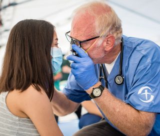 Dr. Mark Agness cares for a patient at the Samaritan's Purse Emergency Field Hospital in San Pedro Sula, Honduras.