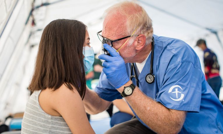 Dr. Mark Agness cares for a patient at the Samaritan's Purse Emergency Field Hospital in San Pedro Sula, Honduras.