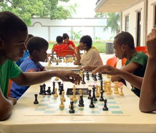 Playing chess is both a favorite pastime and serious undertaking for many students at the Greta Home and Academy. Several chess club members compete at an international level.