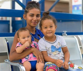 Wuileidy smiles with her two daughters at our maternal child health clinic on the border with Venezuela.