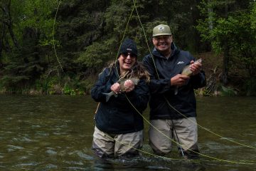 Edith and Edgar Aguilar hooked graylings at the same time on their fly rods in the Kijik River.