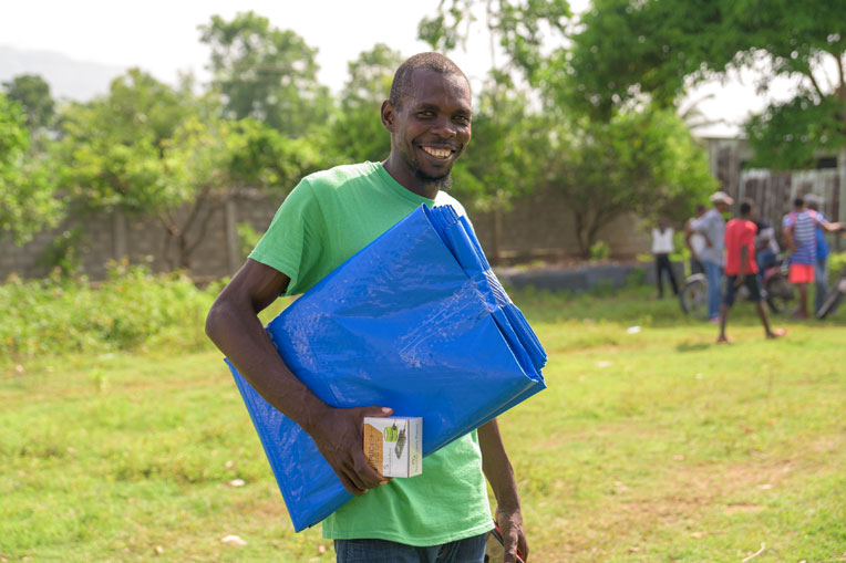 Dano received shelter material and a solar light from our teams.