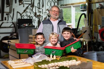 Ken's grandchildren are also involved in the toy-making process.