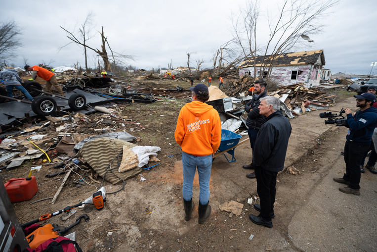 Franklin Graham and his son, Edward, surveyed the damage in Mayfield, Kentucky, caused by an EF4 tornado in early December.