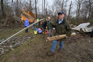 Vice President Mike Pence worked hard on Sat., Dec. 18, in Mayfield, Kentucky.