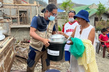 Our teams distribute aid in hard-hit island communities.