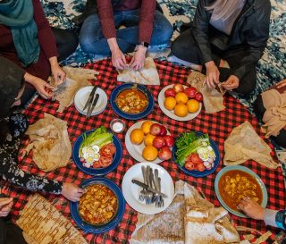 Sharing meals together is a great way for church sponsors and Afghan families to get to know one another and to begin forming friendships.