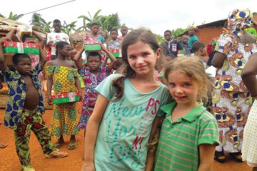 Arwen and her sister, Elora, handed out Operation Christmas Child shoebox gifts in a village in Togo.