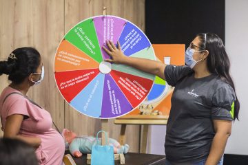 During a motherhood course offered at the clinic, women learned about lactation, nutrition, and other healthcare topics for expectant mothers.