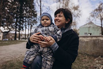 A displaced mother and her child attend a distribution of essential items conducted by Samaritan's Purse in partnership with a local church in Ukraine.