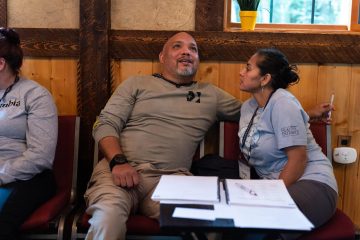Retired Army Staff Sergeant Orlando Gill and his wife, retired Army Sergeant First Class Candy De Hoyos-Gill, share with each other during marriage classes. 