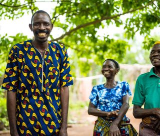 Ogouleroun is smiling ear to ear because last year he received Jesus Christ as his "new King."