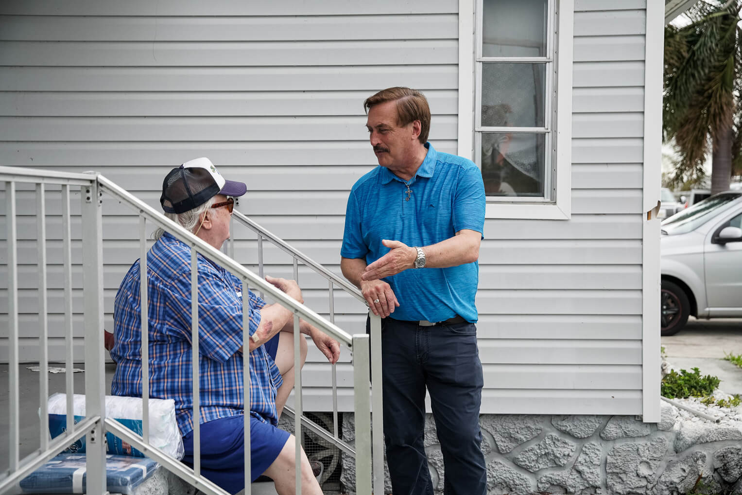 Mike Lindell encouraged Lenny Egan, a 79-year-old disabled veteran.