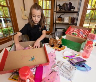 Ava loves packing shoebox gifts for Operation Christmas Child.