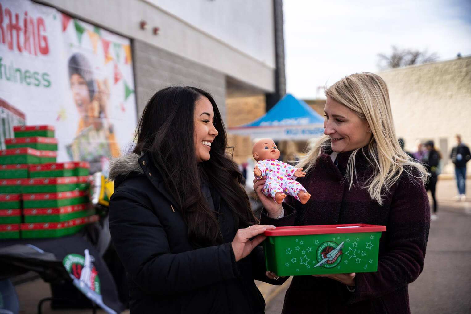 Elizabeth, right, received a shoebox gift as an orphan living in Ukraine.
