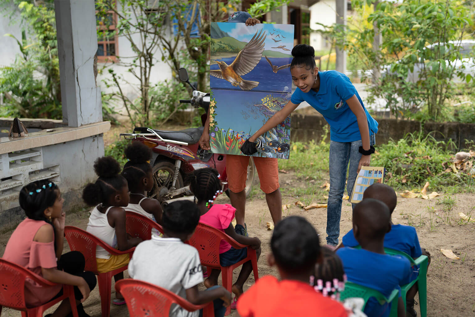 Charahja teaches children at an Operation Christmas Child outreach event in Suriname.
