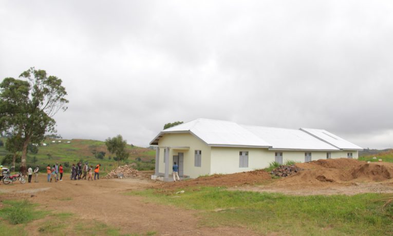 Members of the Evangelical Assembly of Sorodo enter their new building.