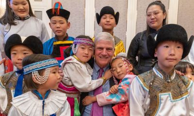 Franklin Graham is all smiles with children who received cardiac surgery through Children’s Heart Project.