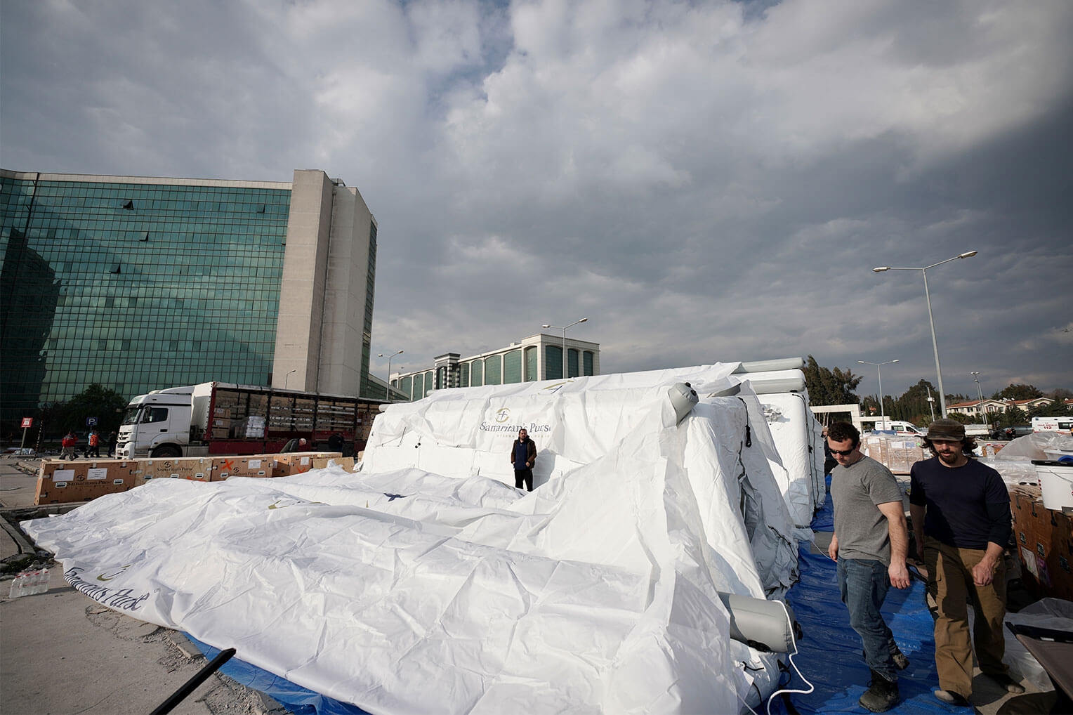 The Disaster Assistance Response Team (DART) is hard at work to get the Emergency Field Hospital up and running (Feb. 12).