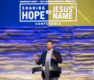 Edward Graham shares with attendees at the Sharing Hope in Jesus' Name conference.