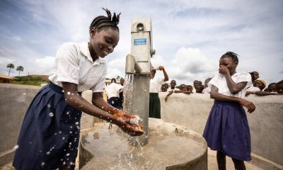 A student at a school in Lofa County, Liberia, is enjoying clean water from a newly-constructed well provided by Samaritan’s Purse.