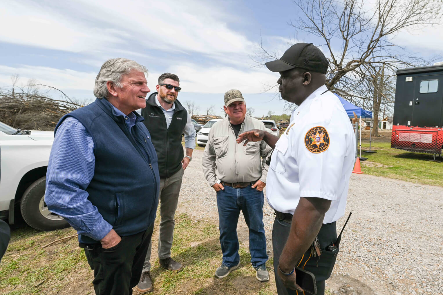 Franklin Graham and Edward Graham met with Silver City Mayor Bob Hairston, center, and Bruce Williams, sheriff of Humphrey County.