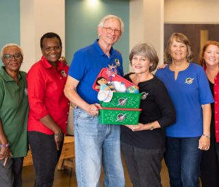 A lineup of volunteers with Operation Christmas Child.