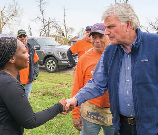 Franklin Graham greets a homeowner in Mississippi in the wake of terrible tornadoes.