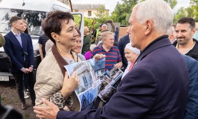 Mike Pence meets with residents outside Kyiv.