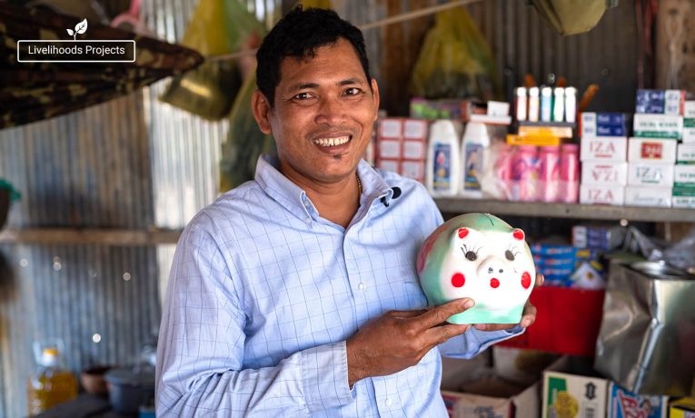 Through the Samaritan's Purse livelihoods project in Cambodia, Chheng learned the value of saving a portion of his income and is able to store it in a ceramic pig he received while enrolled in the program.