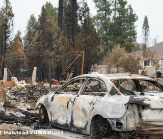 A burned out car in Spokane, Washington, neighborhood.